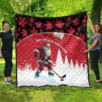 Red and white quilt showing Santa hockey player with “BEST PUCKING XMAS EVER” text.