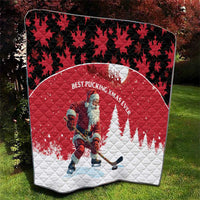 Red quilt with Santa hockey player and “BEST PUCKING XMAS EVER” across white arc.