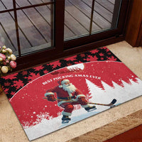 Red Christmas doormat with Santa hockey player and “Best Puckin’ Xmas Ever” text