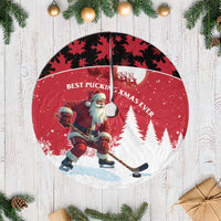 Red Christmas tree skirt with Santa hockey player graphic, round white border