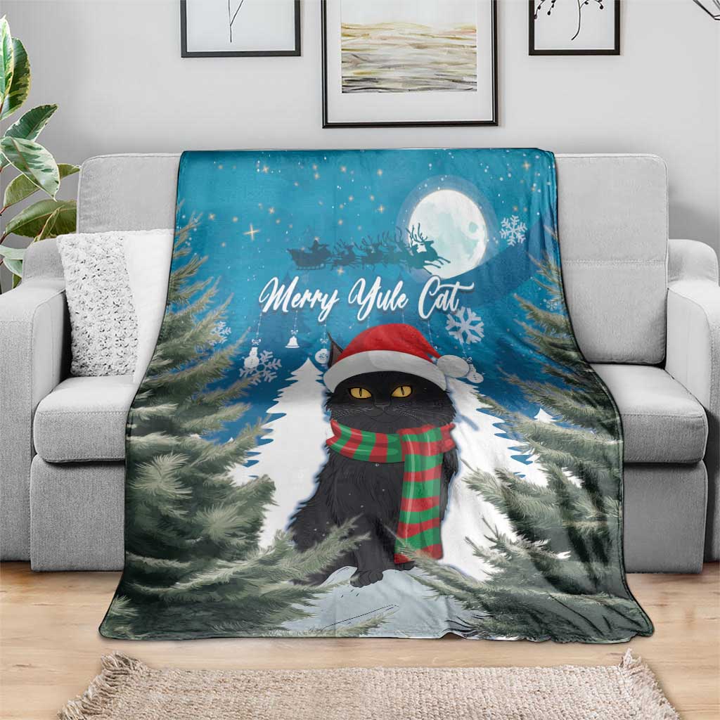 Blue Christmas blanket with black cat wearing scarf in snowy pine path