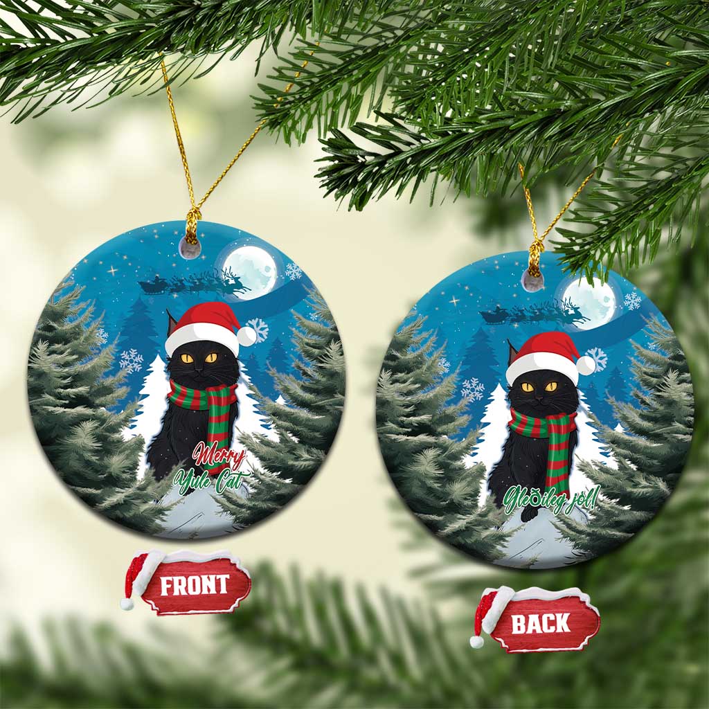Two blue oval ceramic ornaments with black cat in Santa hat and red plaid scarf