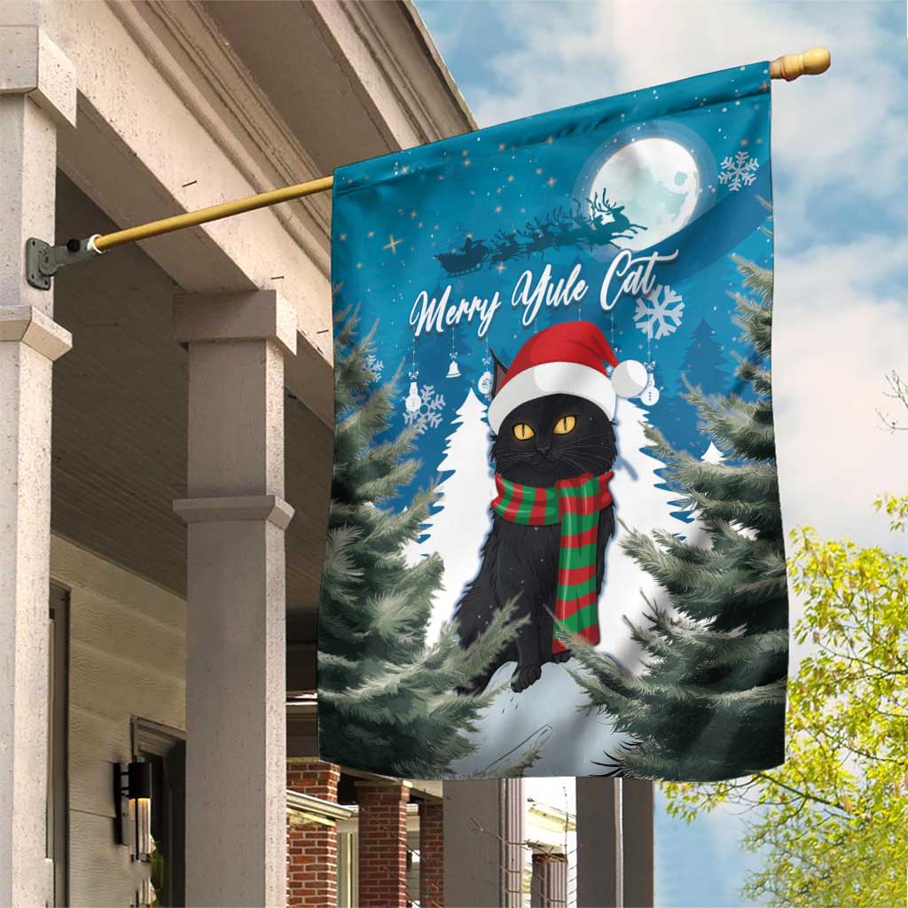 Blue Christmas garden flag with black cat wearing Santa hat and red-green scarf
