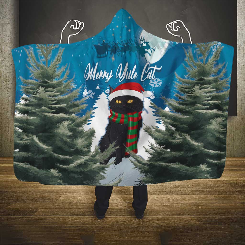 Blue hooded Christmas blanket featuring cat in Santa hat and snowy path design