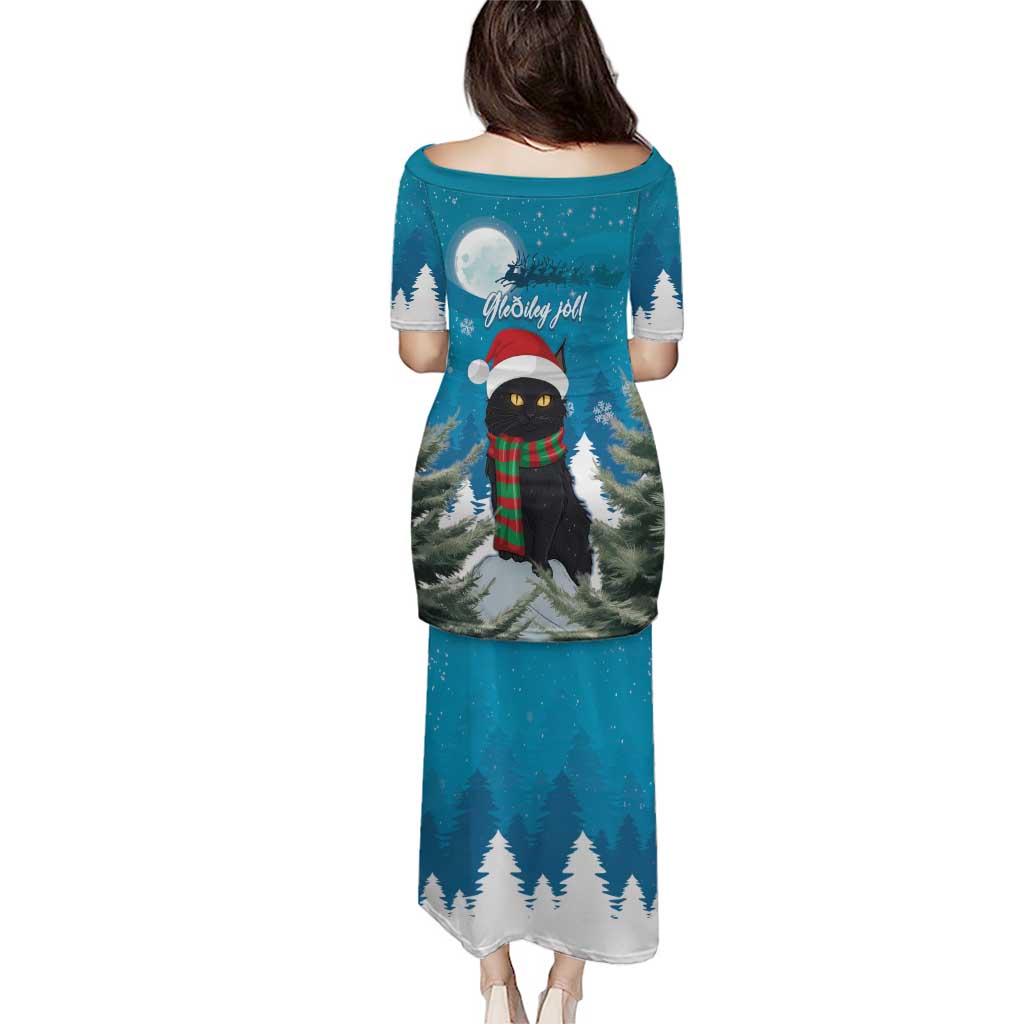 Blue long Christmas dress, back view, cat graphic with snow trees and Merry Yule Cat text.
