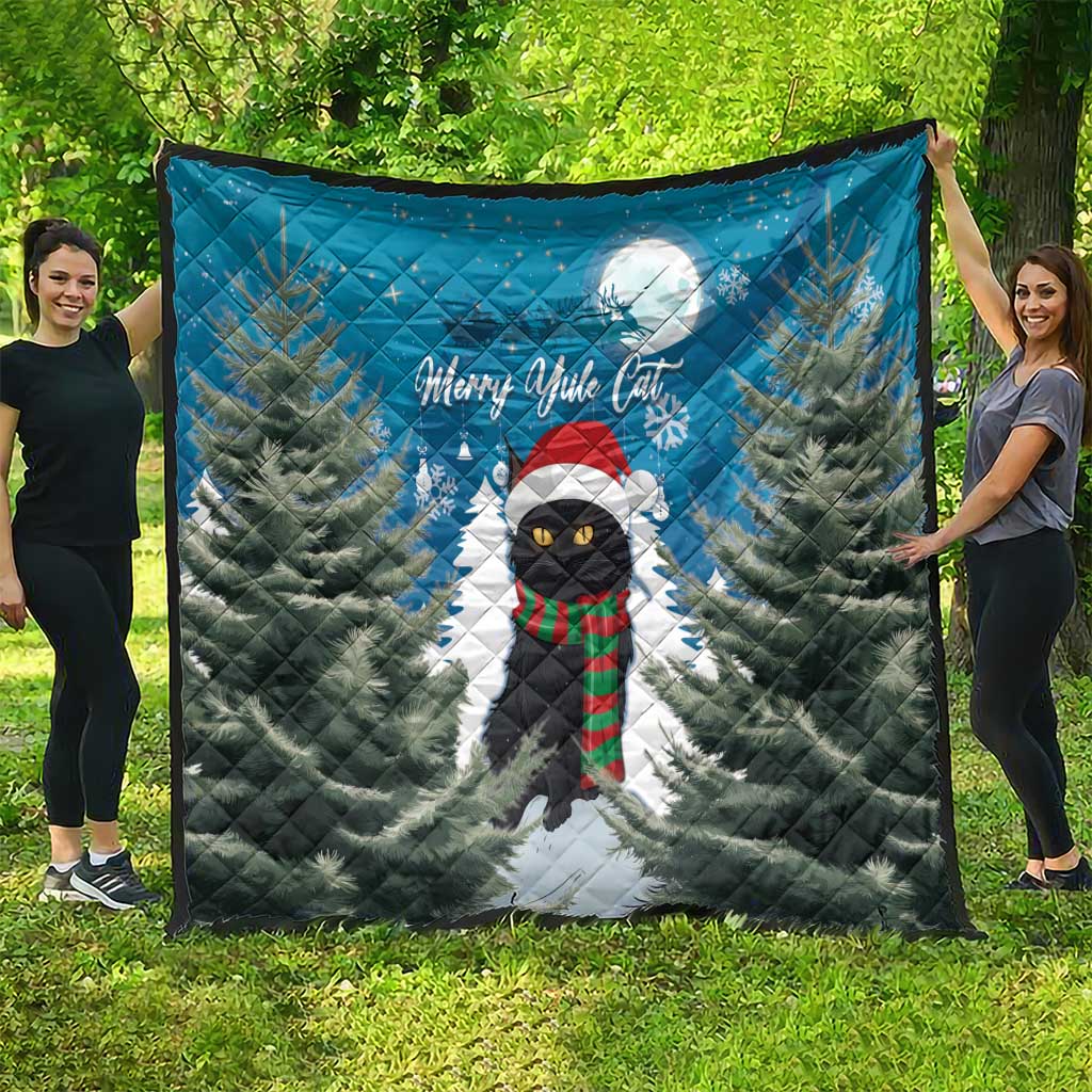 Blue quilt blanket showing Merry Yule Cat with winter pine forest and full moon.