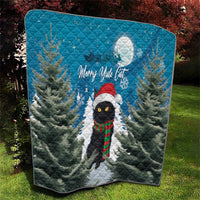 Blue holiday quilt featuring a cat in Santa hat, pine trees, moon, and Merry Yule Cat text.