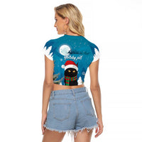 Blue cropped raglan T-shirt, back print with cat Santa hat under moon