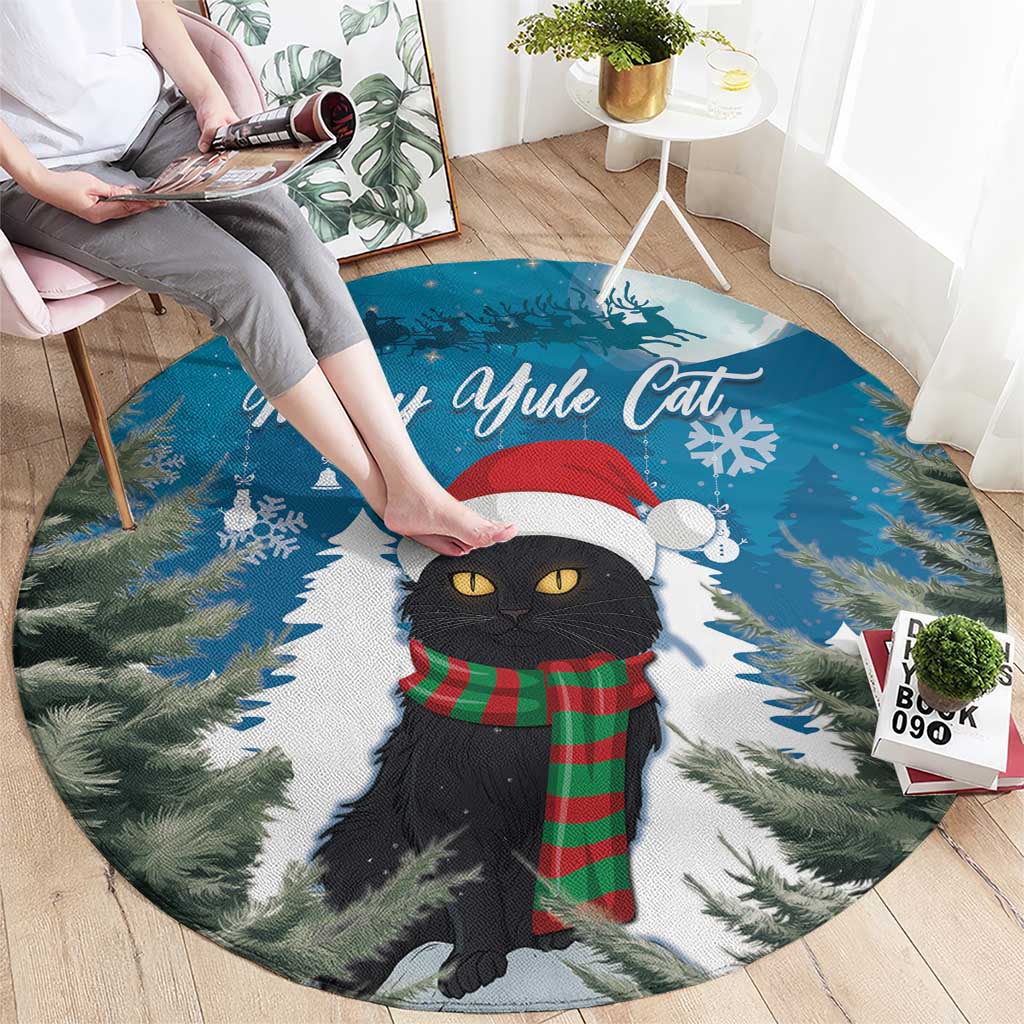 Blue circular rug with black cat in red Santa hat, 'Merry Ayule Cat' and snowflakes