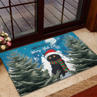 Blue rubber Christmas doormat featuring black cat with Santa hat, red-green scarf, pine trees