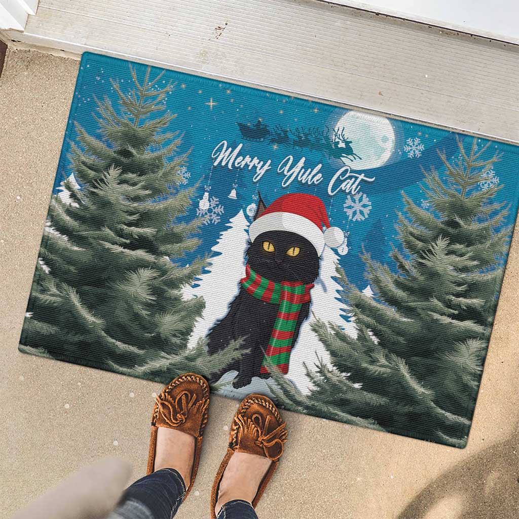 Blue rubber Christmas doormat with cat in Santa hat, red-green scarf, snowflakes and trees