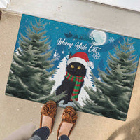 Blue rubber Christmas doormat with cat in Santa hat, red-green scarf, snowflakes and trees