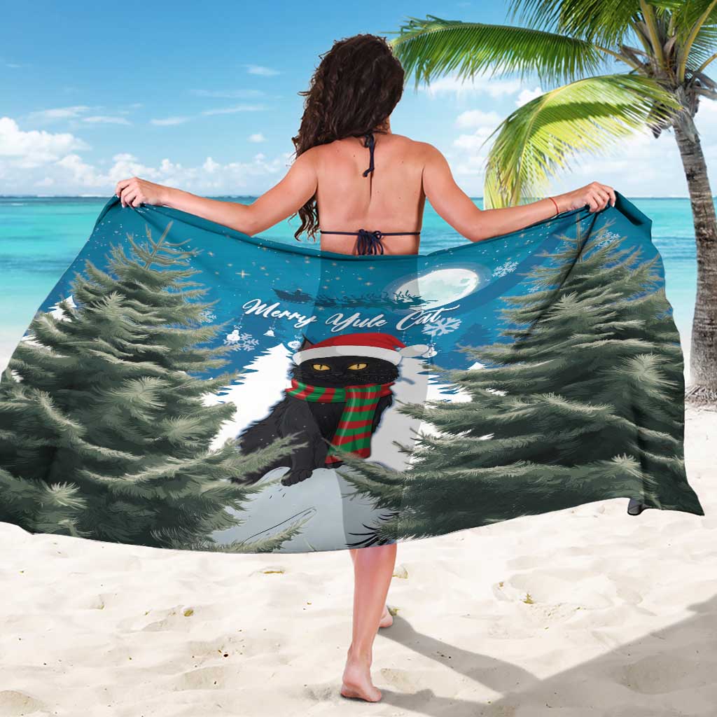 Blue Christmas cat sarong draped over shoulders, showing full cat, trees, and moon