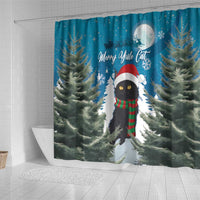 Blue Christmas shower curtain showing black cat in holiday hat and scarf with pine branches
