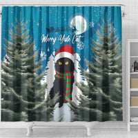Blue shower curtain with Merry Yule Cat lettering, black cat with hat and red-green scarf