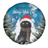 Round blue spare tire cover with Merry Yule Cat, Santa hat, green-red plaid scarf, and trees