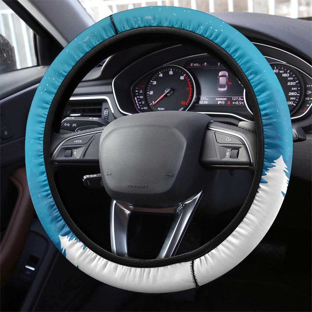 Blue steering wheel cover with white snow-themed border and stitched edge
