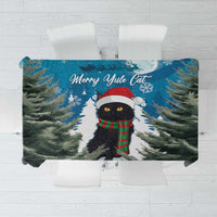 Blue Christmas tablecloth with cat in Santa hat, fir trees and snowflake print
