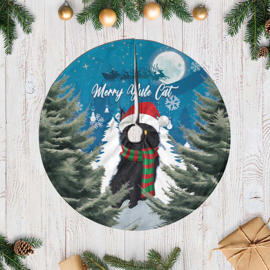 Blue round Christmas tree skirt with white fringe and Merry Yule Cat illustration