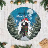 Blue round Christmas tree skirt with white fringe and Merry Yule Cat illustration