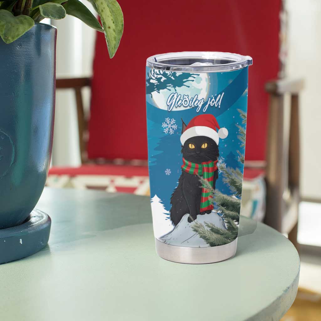 Blue Christmas cat tumbler cup with snowflake and red hat graphic, silver lid