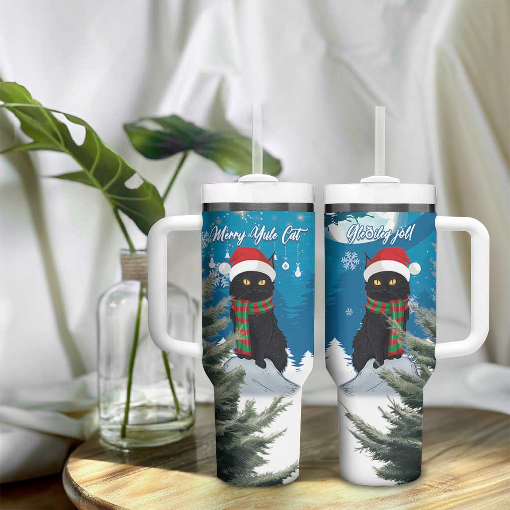 Pair of blue Christmas tumblers with handles and straw lids, cat holiday graphics