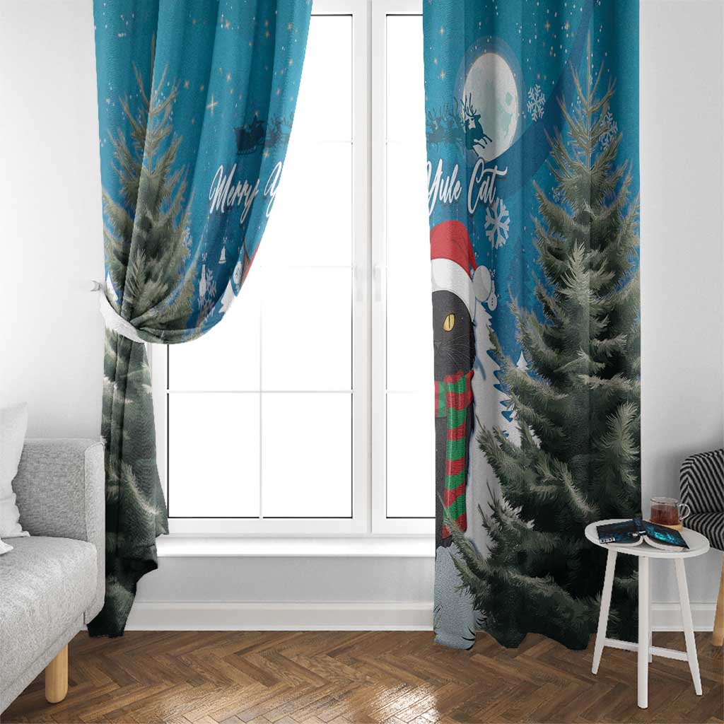 Blue window curtain panels with cat graphic and pine trees beside a white door