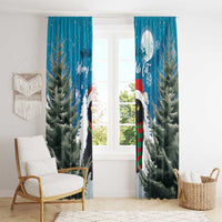Blue window curtain panels with cat in Santa hat and dense pine tree print