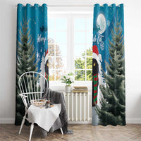 Blue window curtain pair with black cat design, pine trees, and Merry Yule text