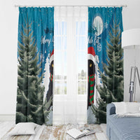 Blue window curtain panels with cat graphic, pine trees, and snowflake accents