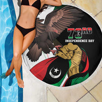 Round beach blanket with black eagle and lion independence graphic, white tassel fringe