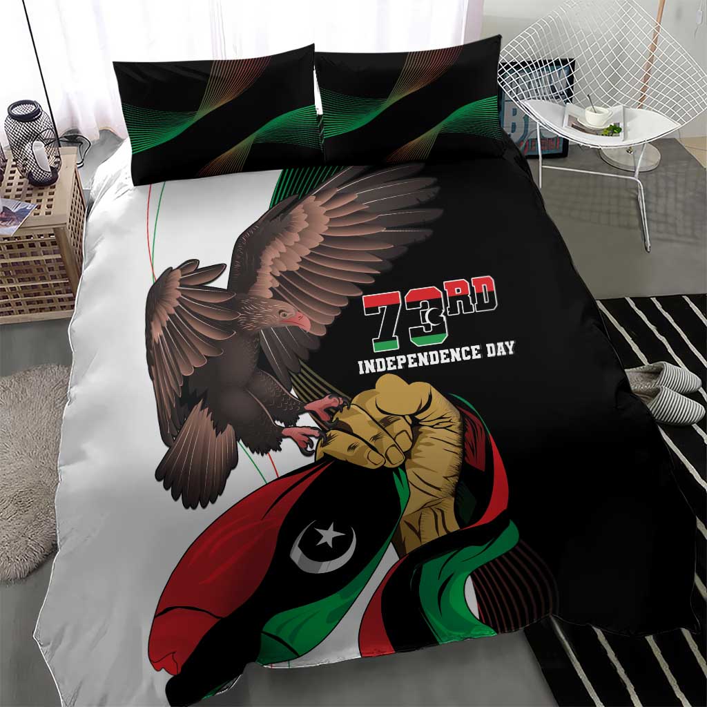 Bedding set close-up with black duvet showing eagle, Libyan flag, and 73rd Independence Day text