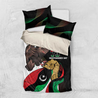 Bedding set with black duvet and pillows showing eagle over Libyan flag; 73rd Independence Day print
