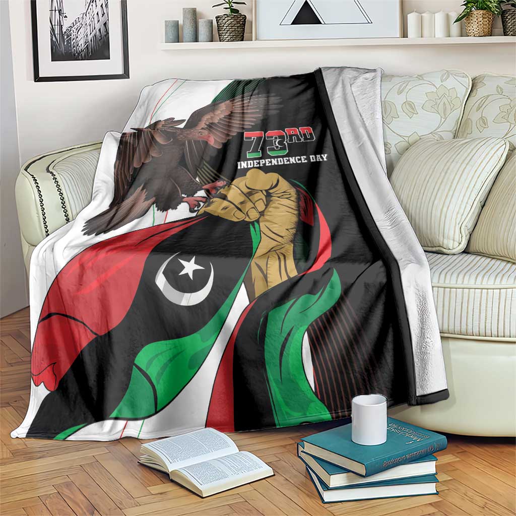 Black 73rd Independence Day blanket draped with eagle, soldier, and Libya tricolor artwork