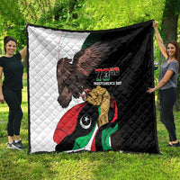 Black-and-white independence day quilt with eagle and Libya flag graphic, "73rd" text
