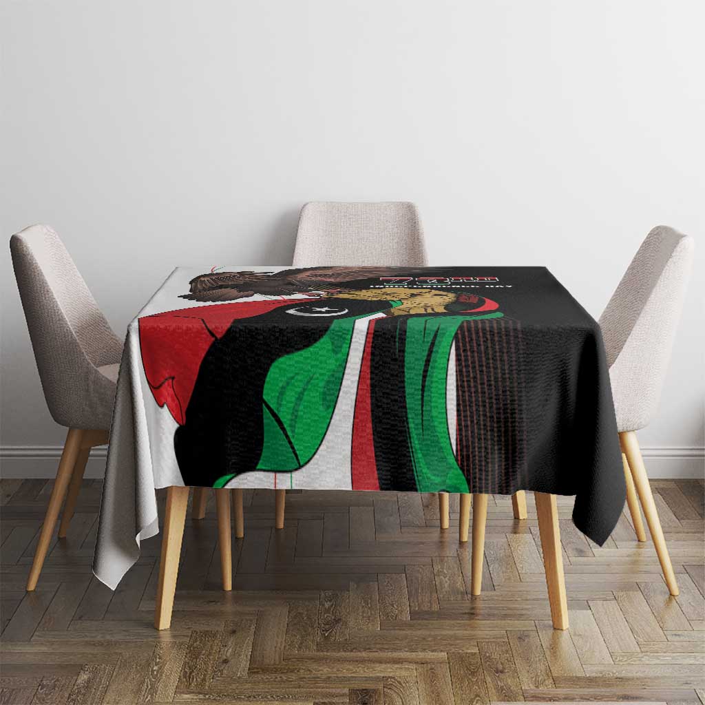 Black tablecloth laid on table with Independence Day eagle and red-green flag stripes