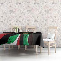 Black tablecloth on dining table with colorful Independence Day flag and eagle artwork