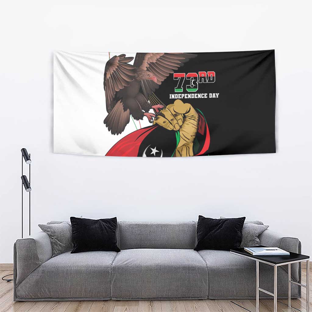 Wall-hung black tapestry with eagle and Libya emblem, 73rd Independence Day