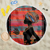 Round beach blanket with tassel fringe, black African woman profile on red ethnic patterned fabric