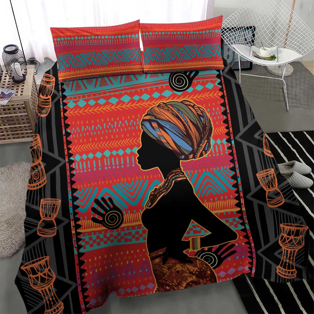 Red tribal-style bedding set with woman silhouette art and colorful geometric stripes