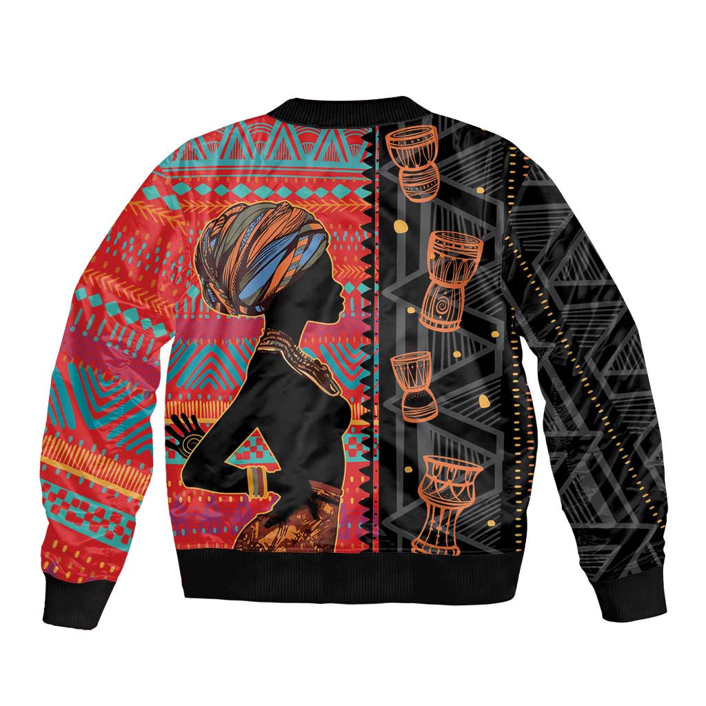 Multicolor African ethnic patterned bomber jacket with lady profile graphic, zip front, ribbed cuffs
