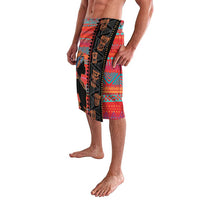Women's lava lava wrap skirt in red with teal orange patterns, side slit and black trim