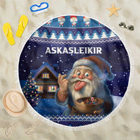 Round blue beach blanket with fringe, festive Santa illustration and patterned winter design