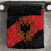 Black and red duvet cover with ALBANIA text and gold eagle emblem, top view