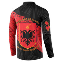 Black long-sleeve button sweatshirt with large shield crest on red-and-black back