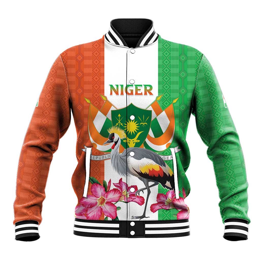 Green and orange varsity baseball jacket with crane and flower graphics, striped ribbed trim