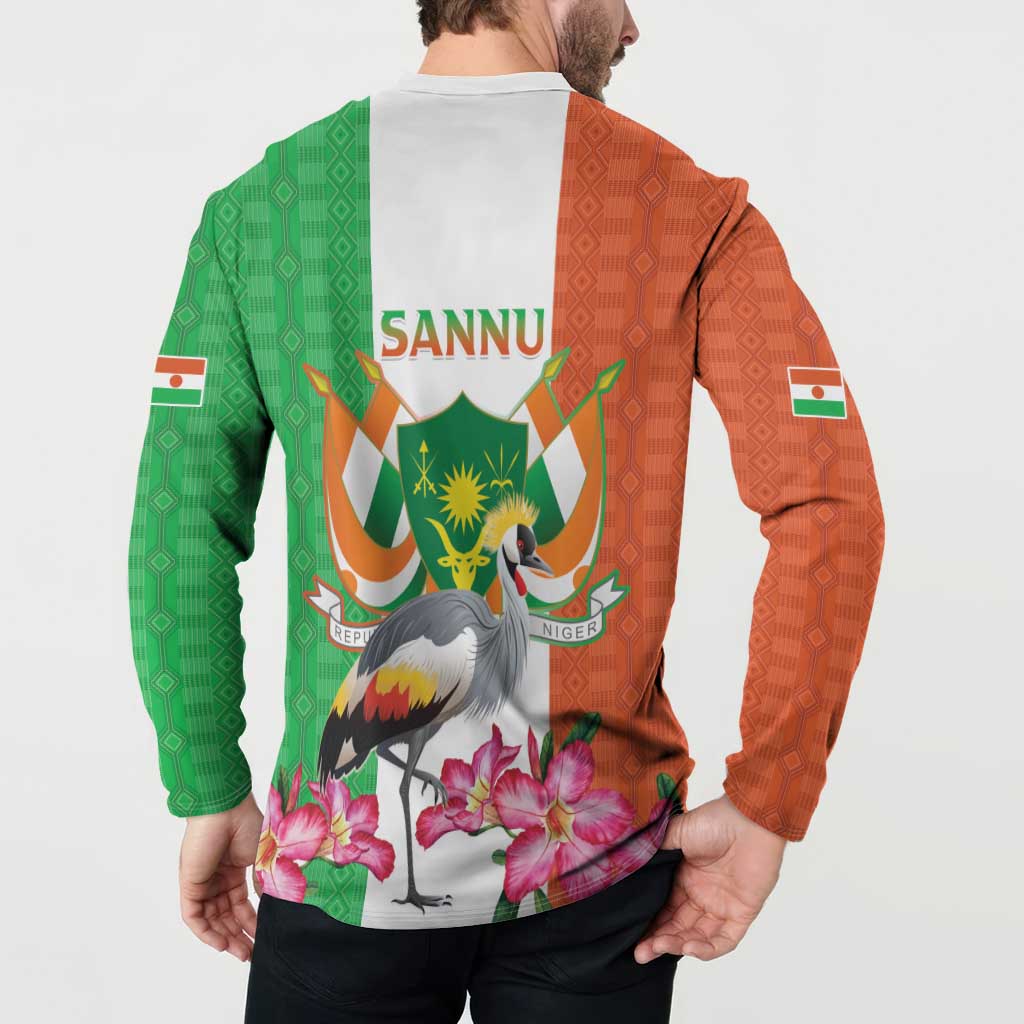 Back view button sweatshirt with “SANNU” text, Niger crest crane and pink flowers, orange/green