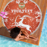 Orange round football beach blanket with white player graphic and Your Text, fringe edge