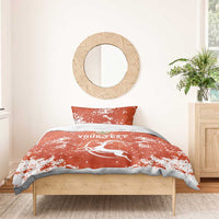 Orange duvet cover with two matching pillows; white splatter horse design and 'YOURTEXT'