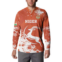 Orange button-up sweatshirt with 'NIGER' chest graphic and antelope emblem
